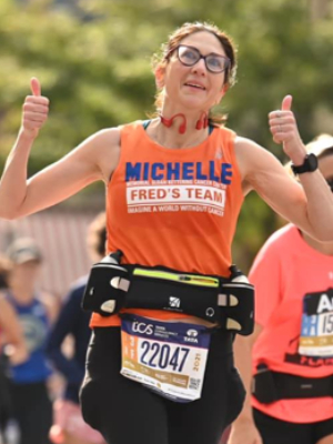 Michelle Morris Goldson running in the NYC Marathon, 2021